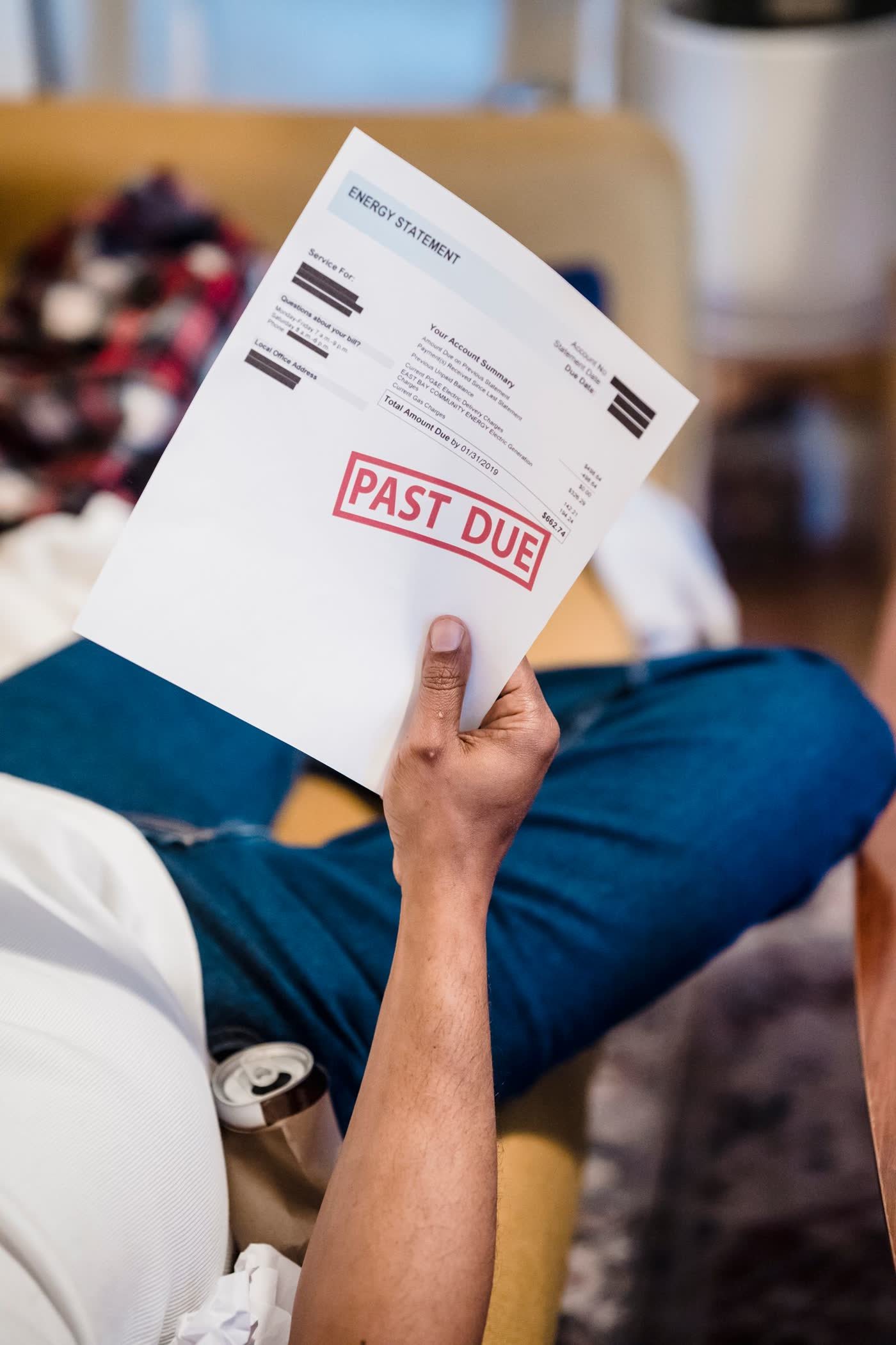 Man reviewing a bill at home
