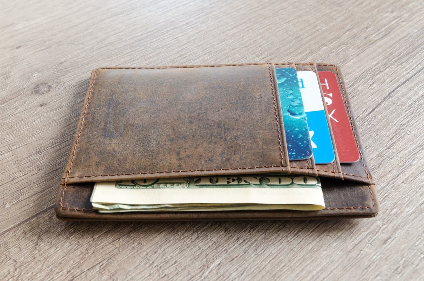 Wallet holding several credit cards